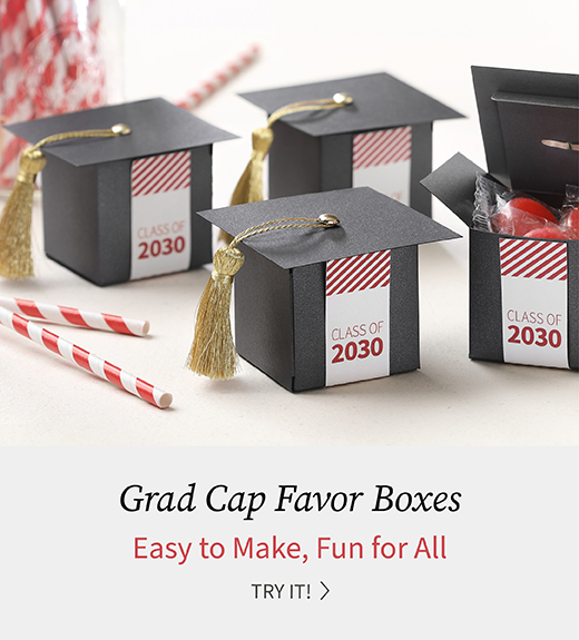Black favor boxes are turned into grad caps and finished with red and white labels.